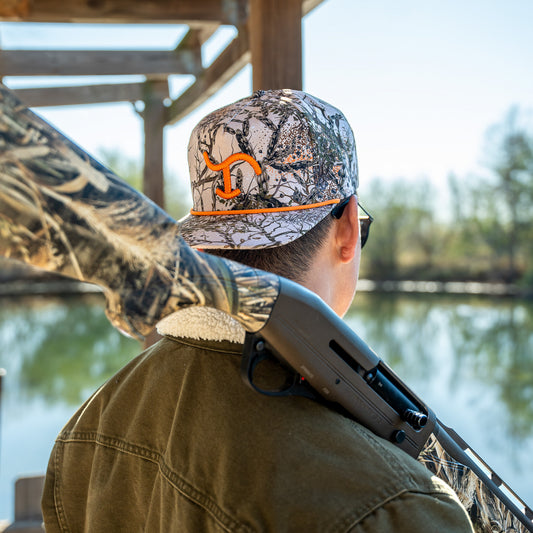 Brush Camo with Orange Brand Cap